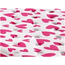 Detalle del tejido con corazones fucsia del Colchón Cuore