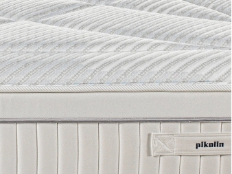 Detalle acolchado superior y ribete perimetral